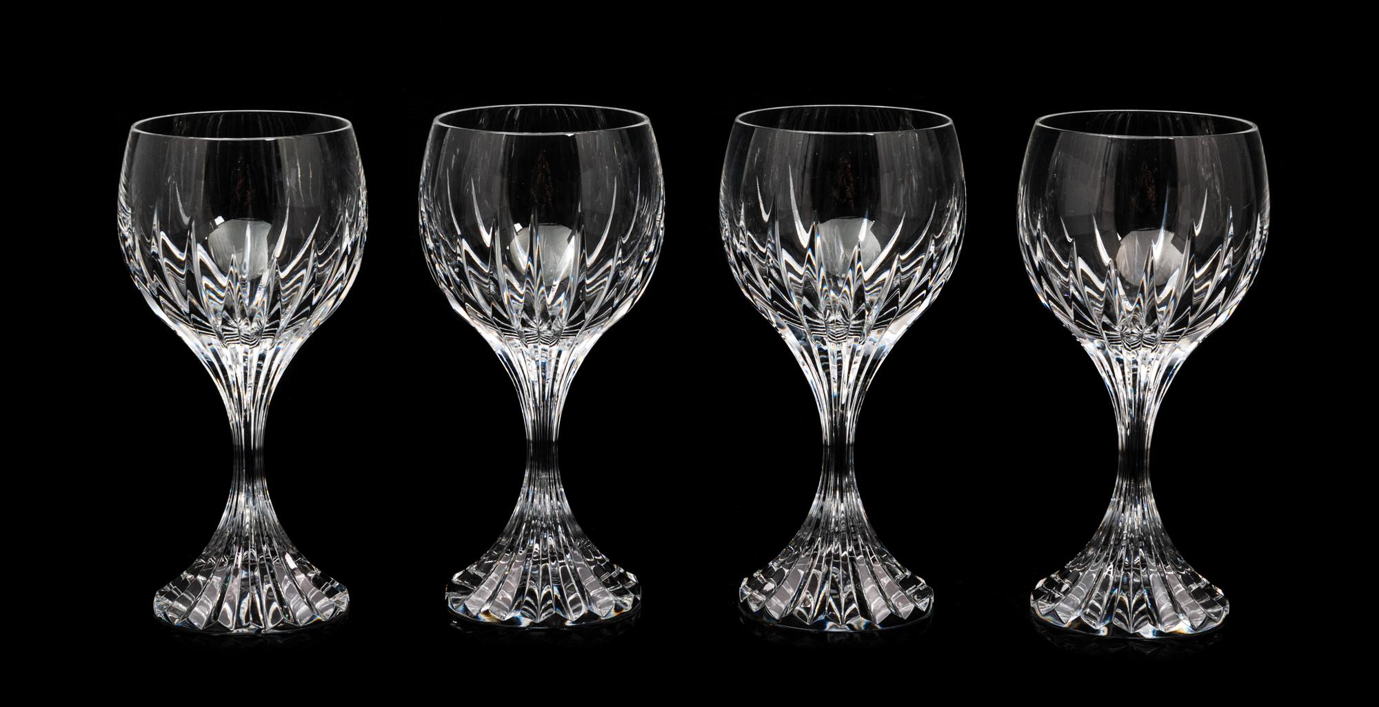 A Set of Twelve Baccarat Wine Glasses Height 6 3/8 inches.