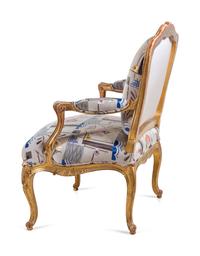 A Louis XV Style Carved Giltwood Fauteuil