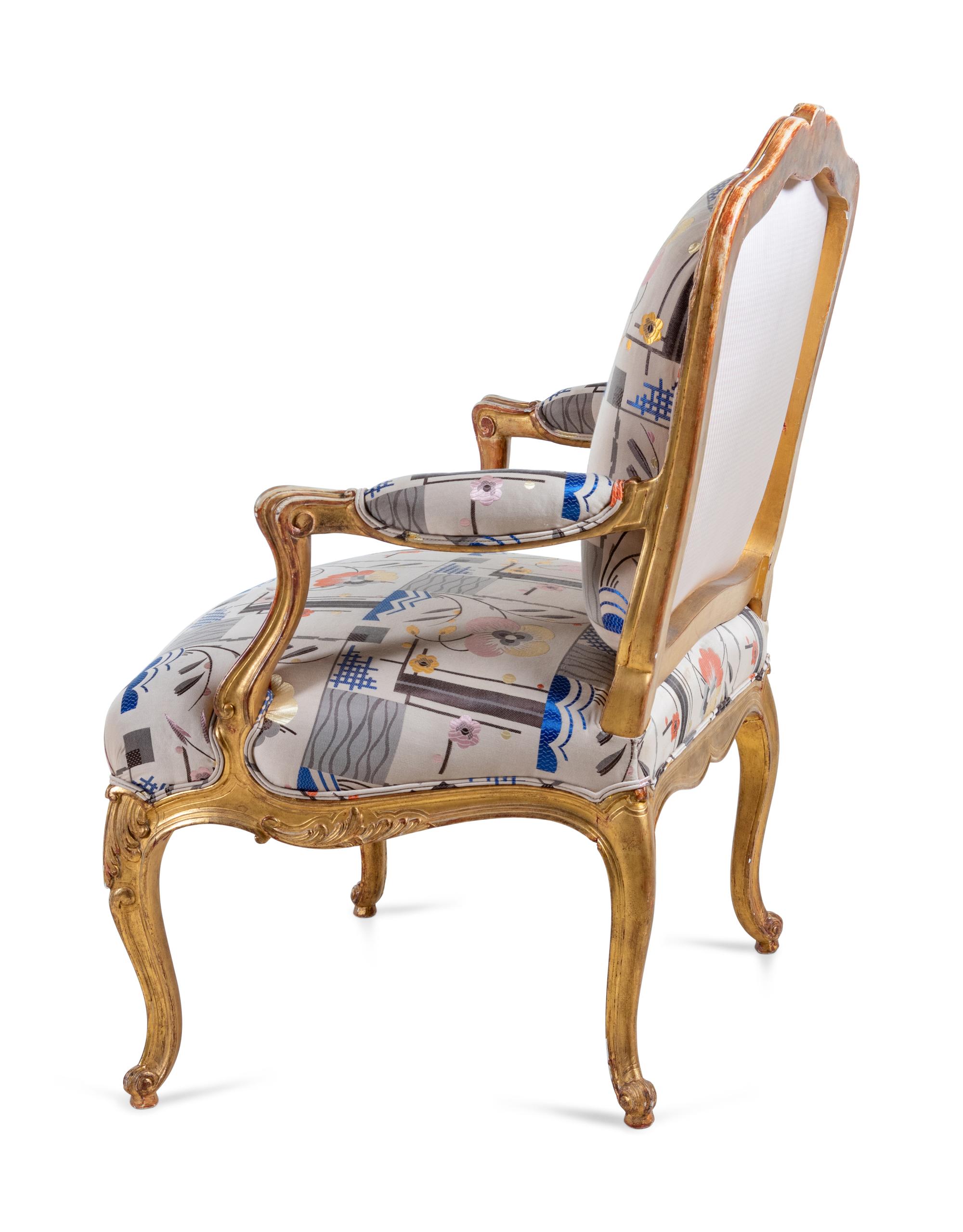A Louis XV Style Carved Giltwood Fauteuil