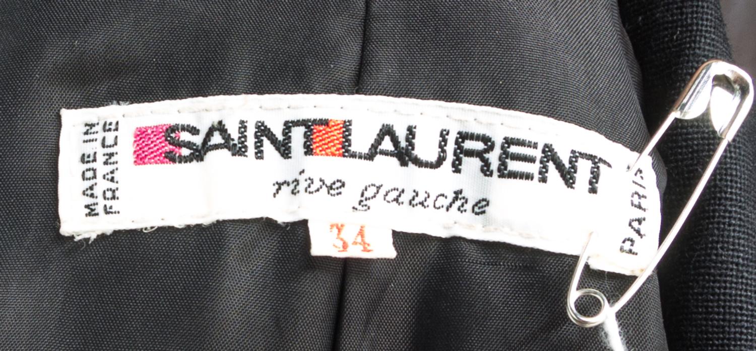 An Yves Saint Laurent Black Wool Double Breasted Coat, Size 34.