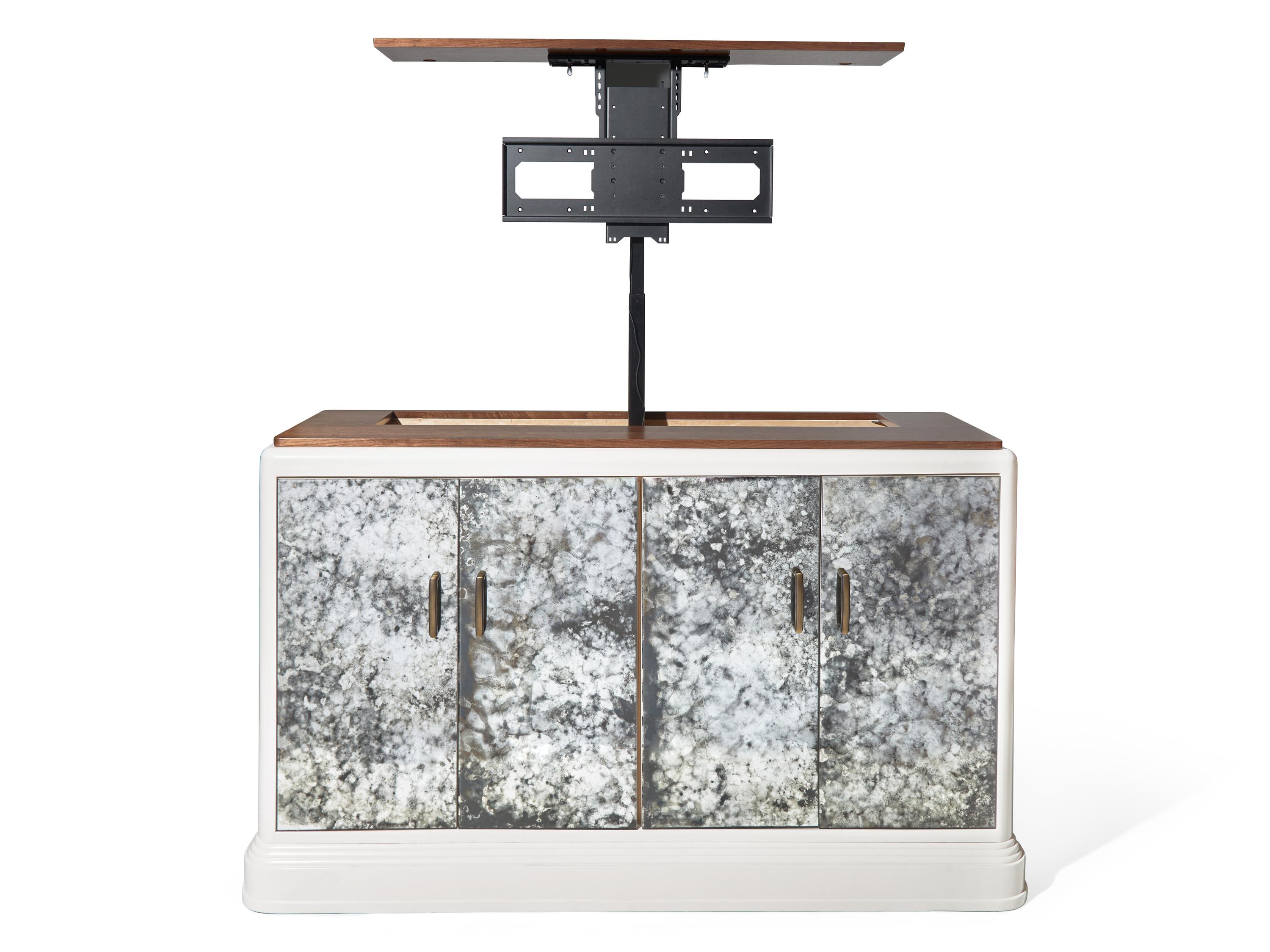 An Antiqued Mirror Mechanized Television Console DONATED BY S.R. GAMBREL, INC.