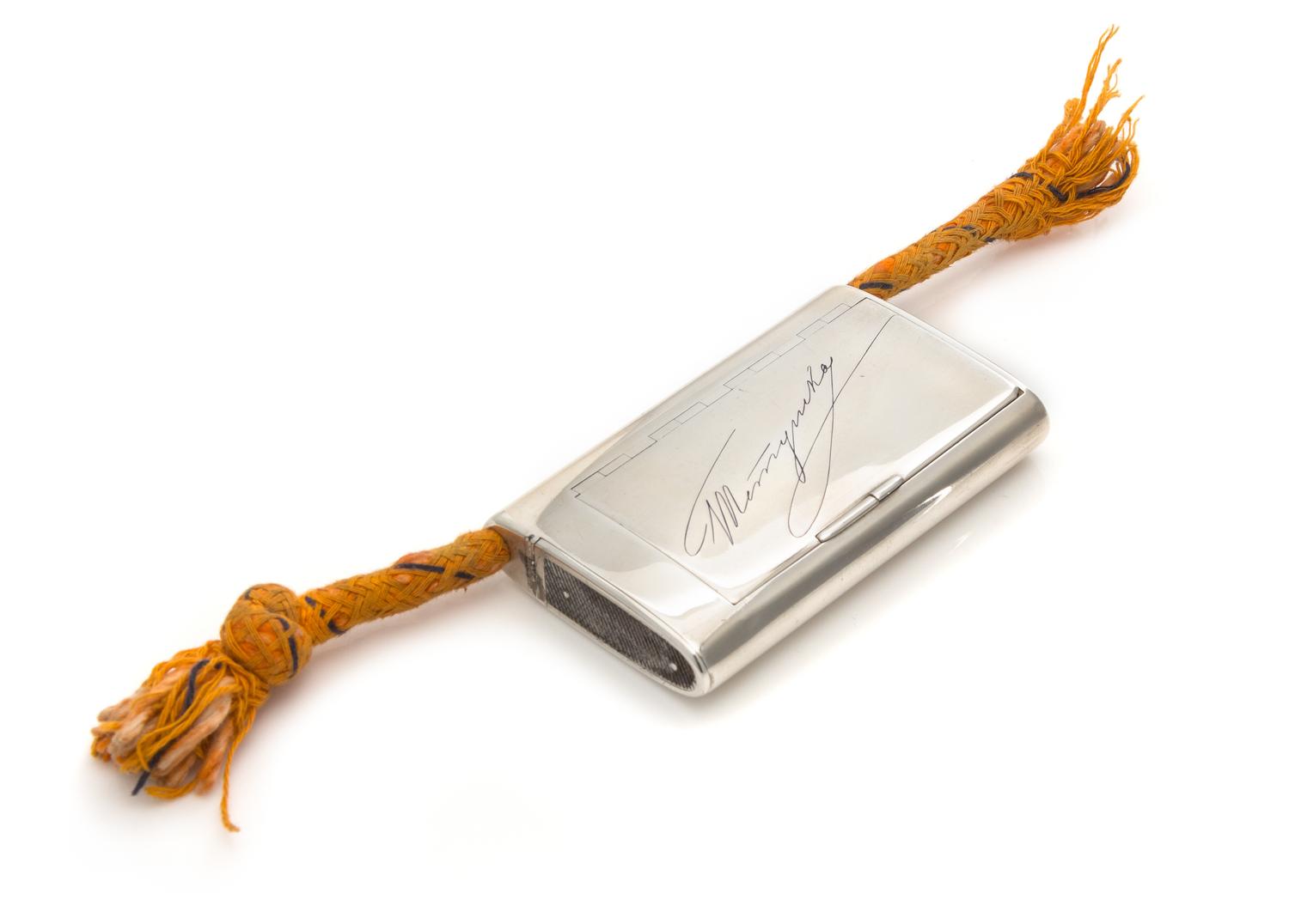 A Russian Silver Cigarette Case, Mark of Samuel Arnd, St. Petersburg, 19th Century, the lid with an enameled signature opening to a sec