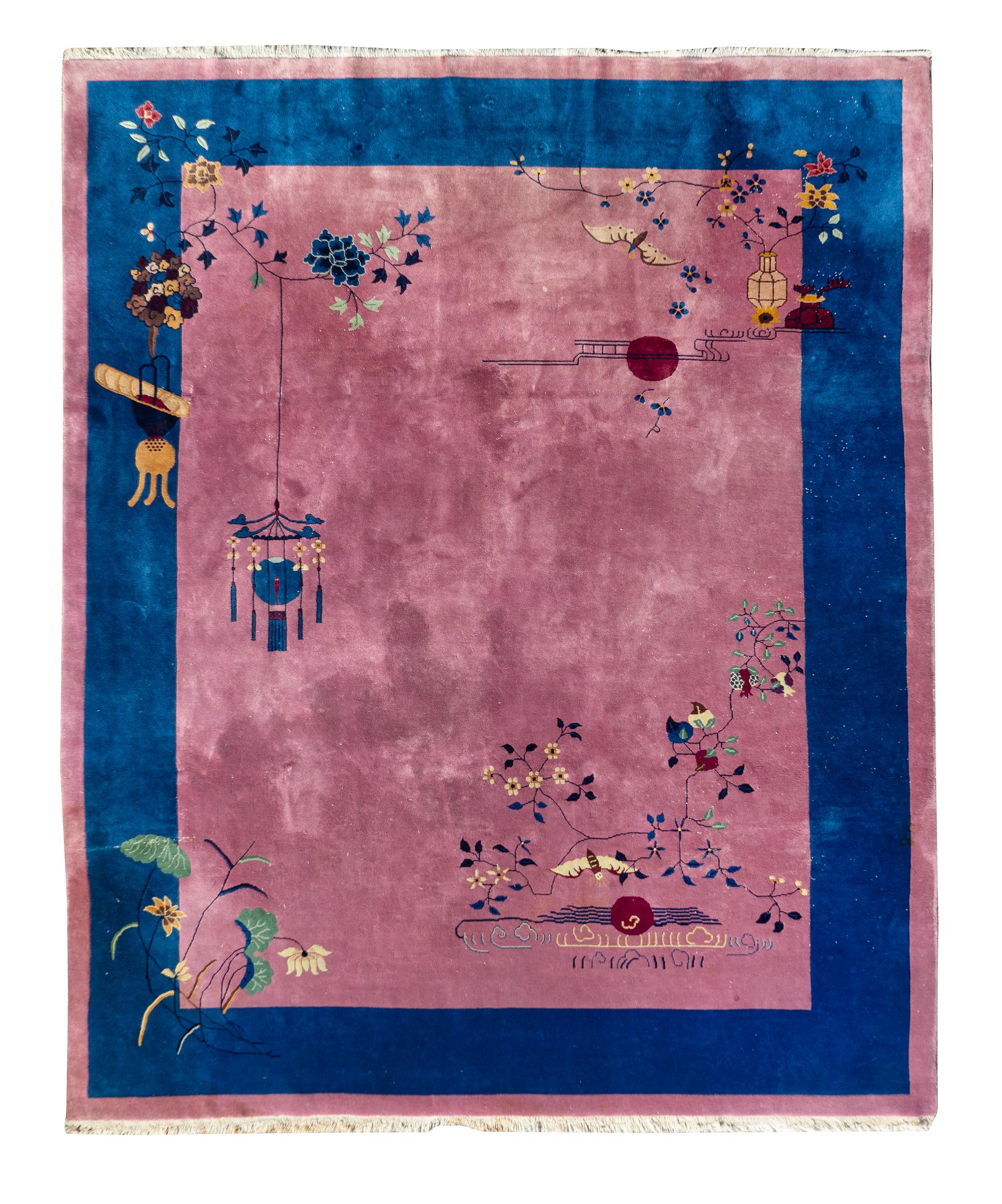 A Chinese Wool Rug — 20TH CENTURY
