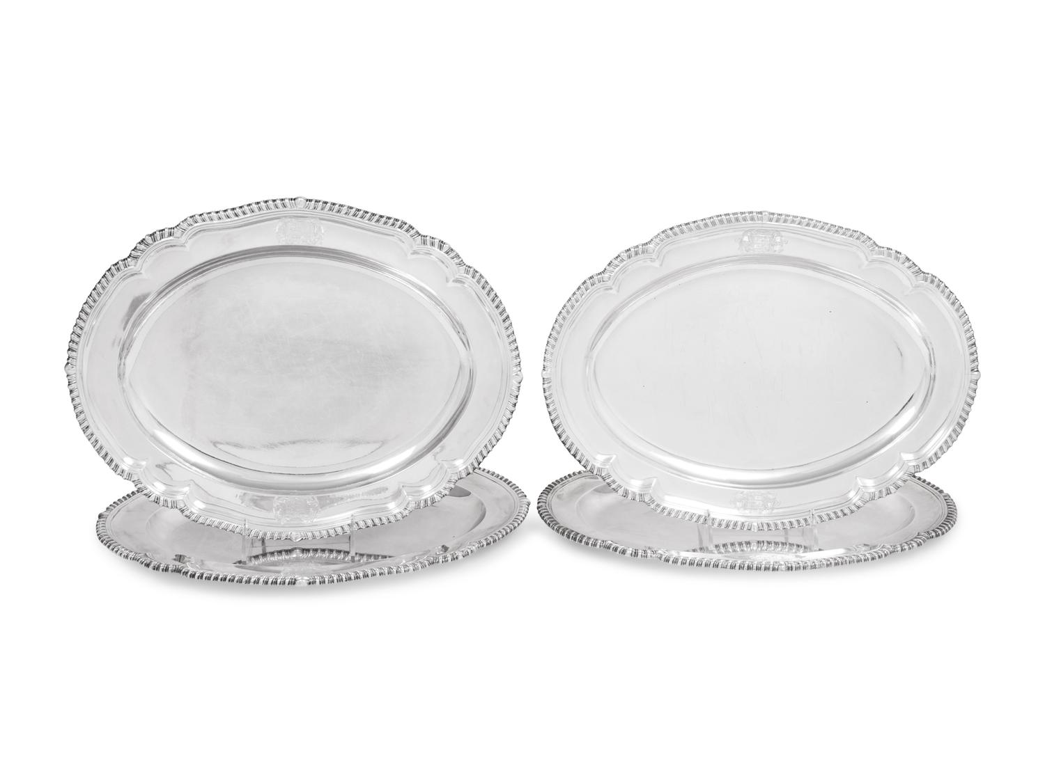 A Set of Four Silver Meat Platters