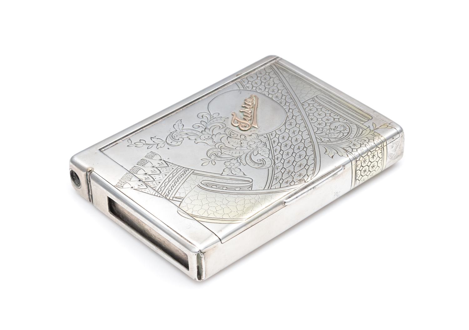 A Russian Silver Cigarette Case, Mark of Ivan Petrovich Speshnev, Moscow, Late 19th Century, the lid worked to show floral sprays and a