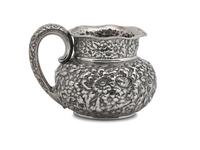 An American Silver Floral Repoussé Water Pitcher