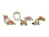 A Collection of Dresden Porcelain Place Cards, Holders and Napkin Rings