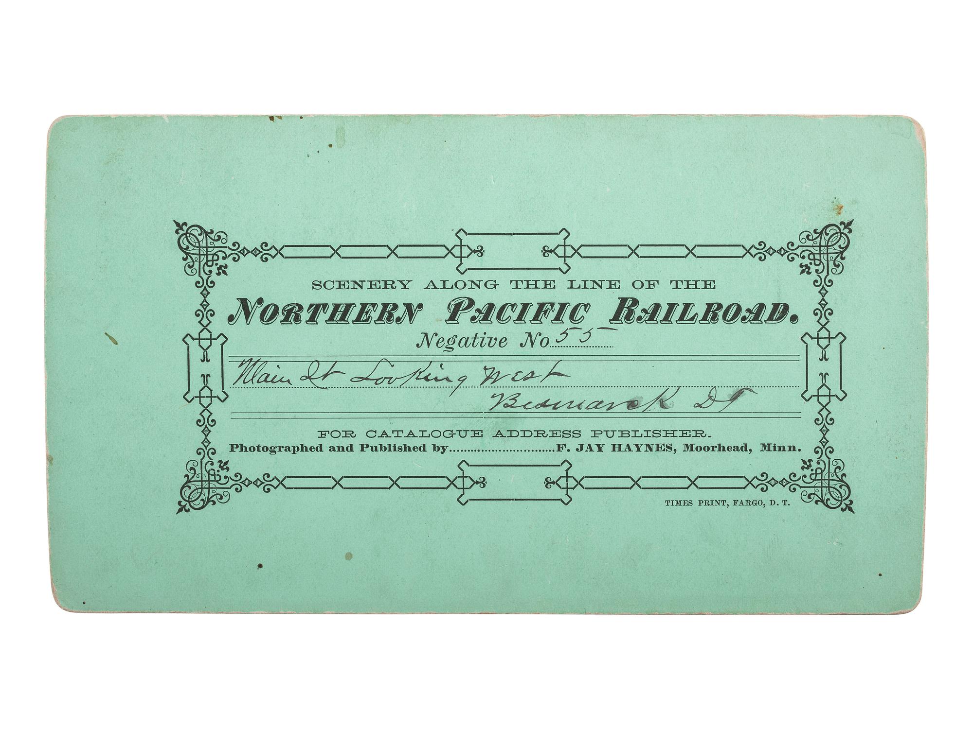 [WESTERN AMERICANA]. HAYNES, F.J., photographer. Stereview of Main Street, Bismarck, Dakota Territory.