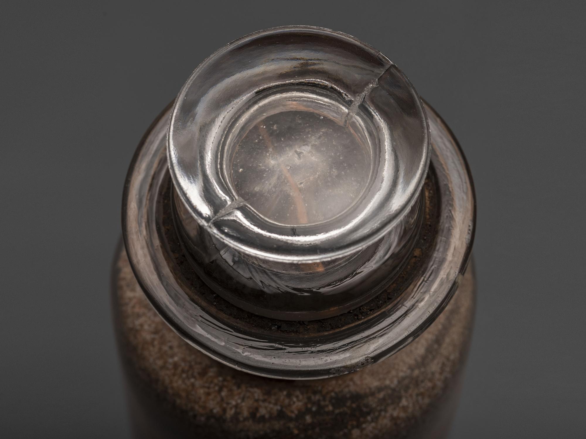 A Pair of Andrew Clemens (American, 1857-1894) 'Sweetheart' Sand Bottles