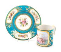 A Sèvres Painted, Parcel Gilt and Celeste Blue-Ground Porcelain Cup and Saucer