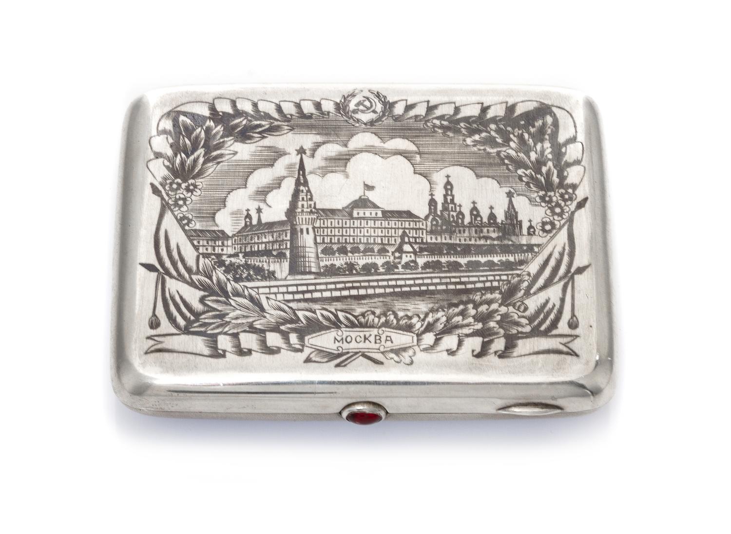 A Soviet Russian Niello Silver Cigarette Case, Maker's mark Cyrillic AMYu, Moscow, 20th century, the lid with an image of the Moscow Kr