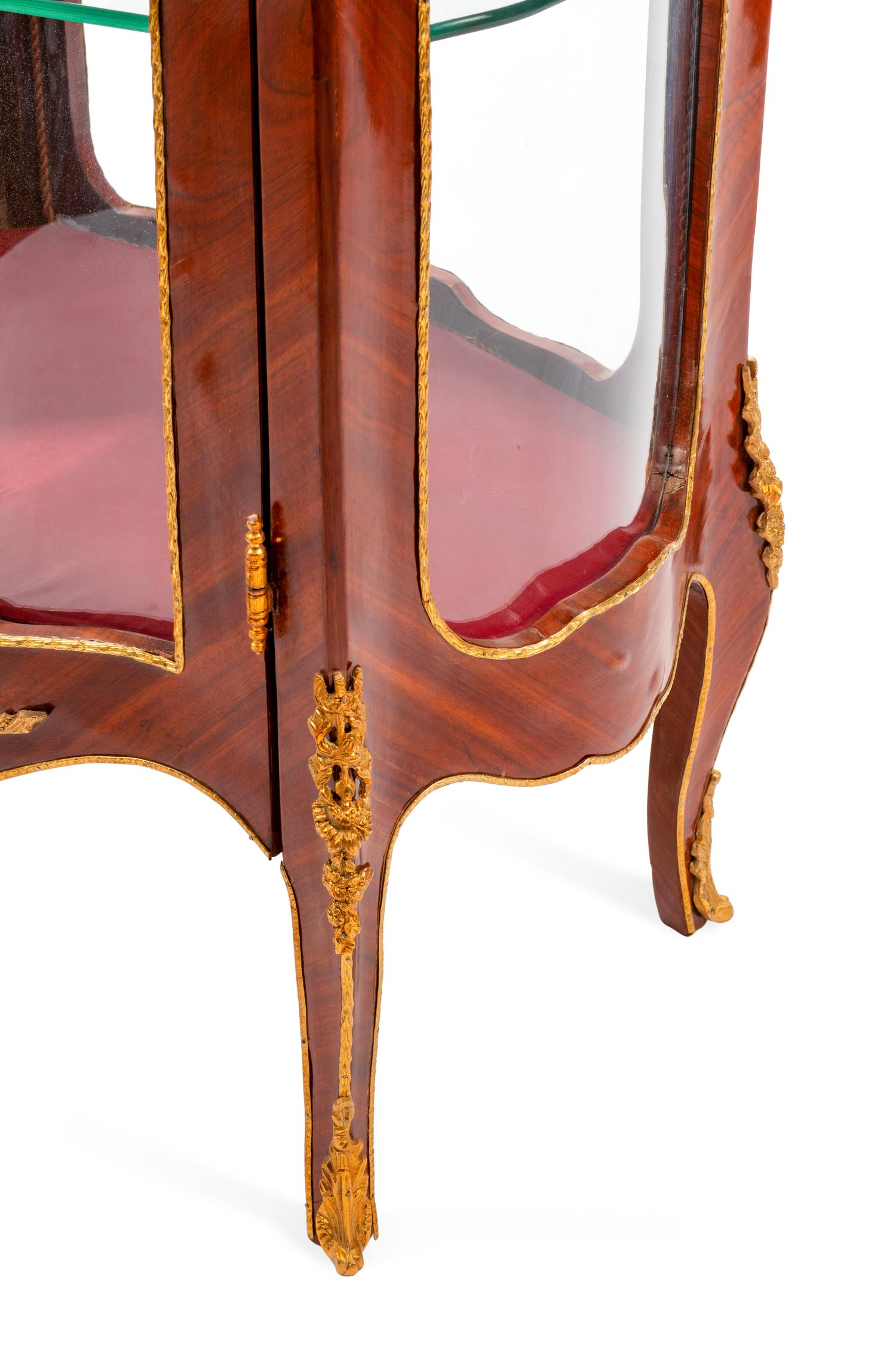A Pair of Louis XV Style Gilt Bronze Mounted Marble-Top Vitrine Cabinets