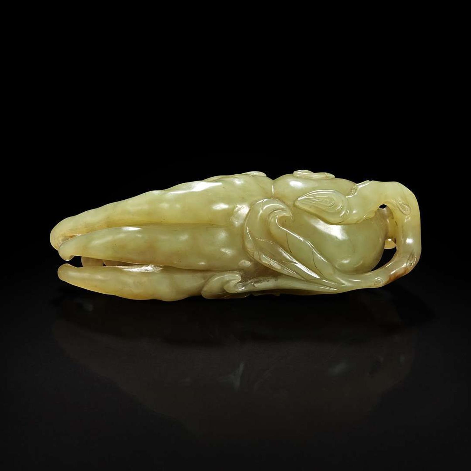 A Chinese celadon jade "Buddha's hand" citron pendant 青玉佛手