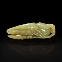 A Chinese celadon jade "Buddha's hand" citron pendant 青玉佛手