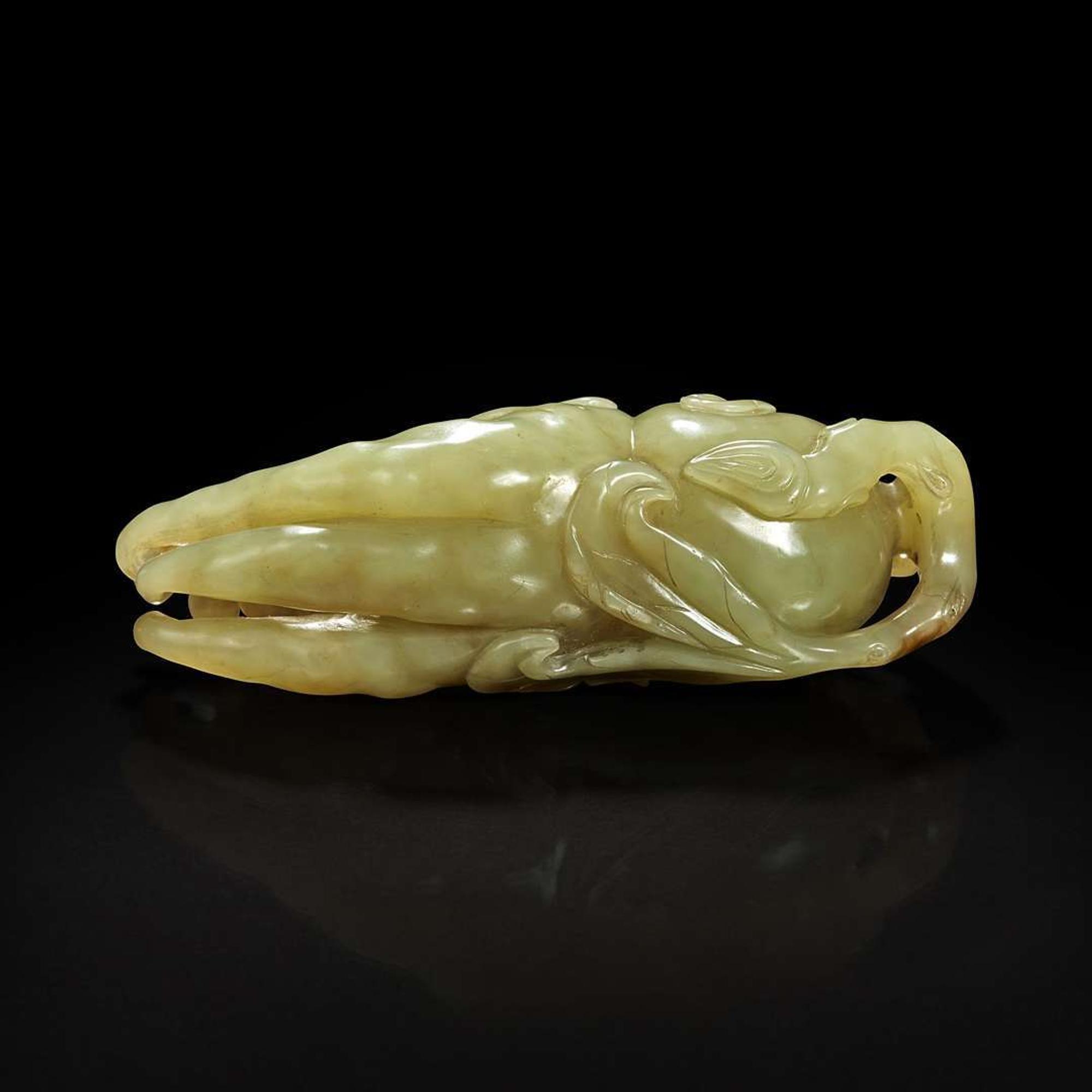 A Chinese celadon jade "Buddha's hand" citron pendant 青玉佛手