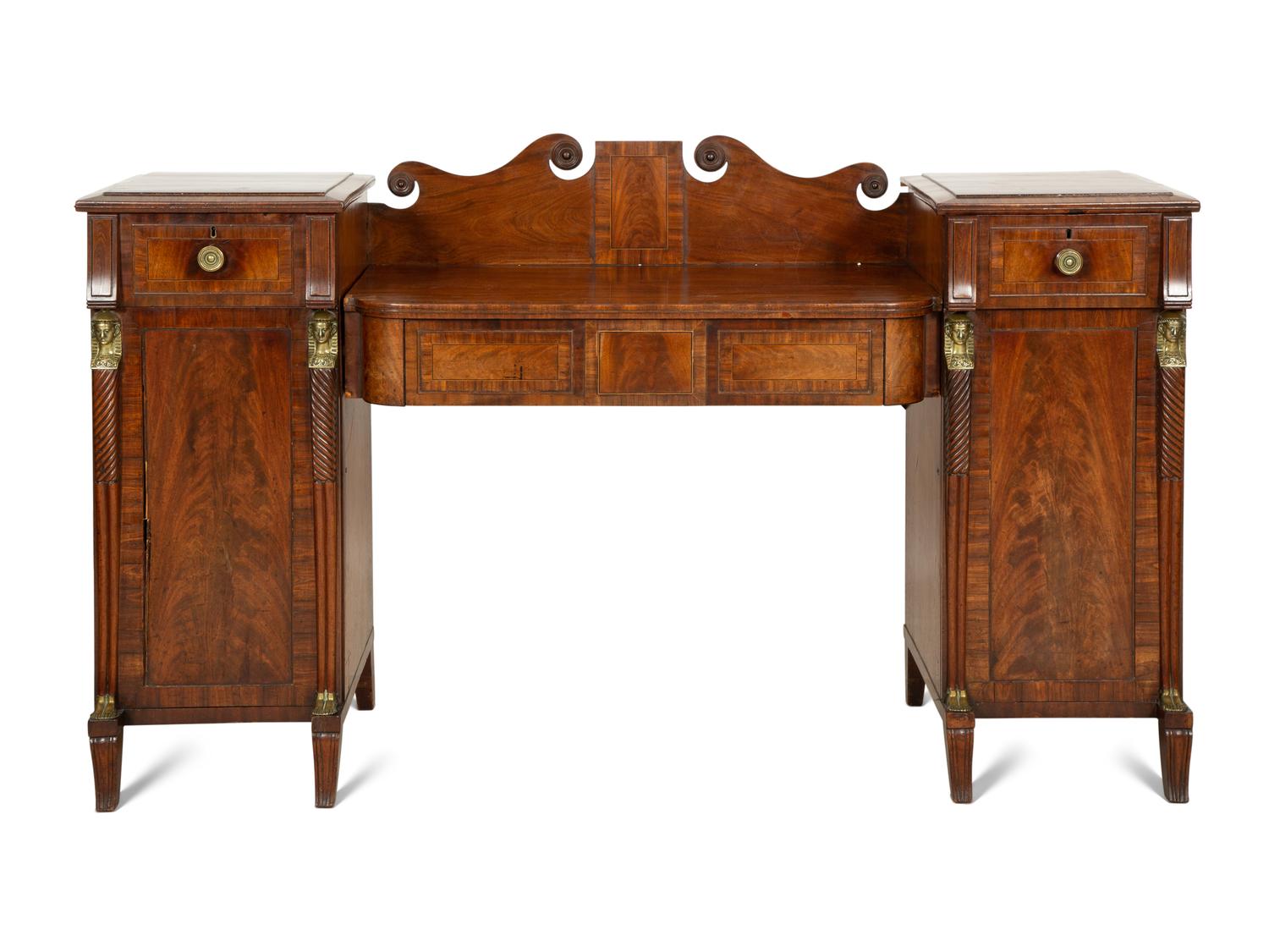 A Regency Gilt Bronze Mounted Mahogany Two-Pedestal Sideboard
