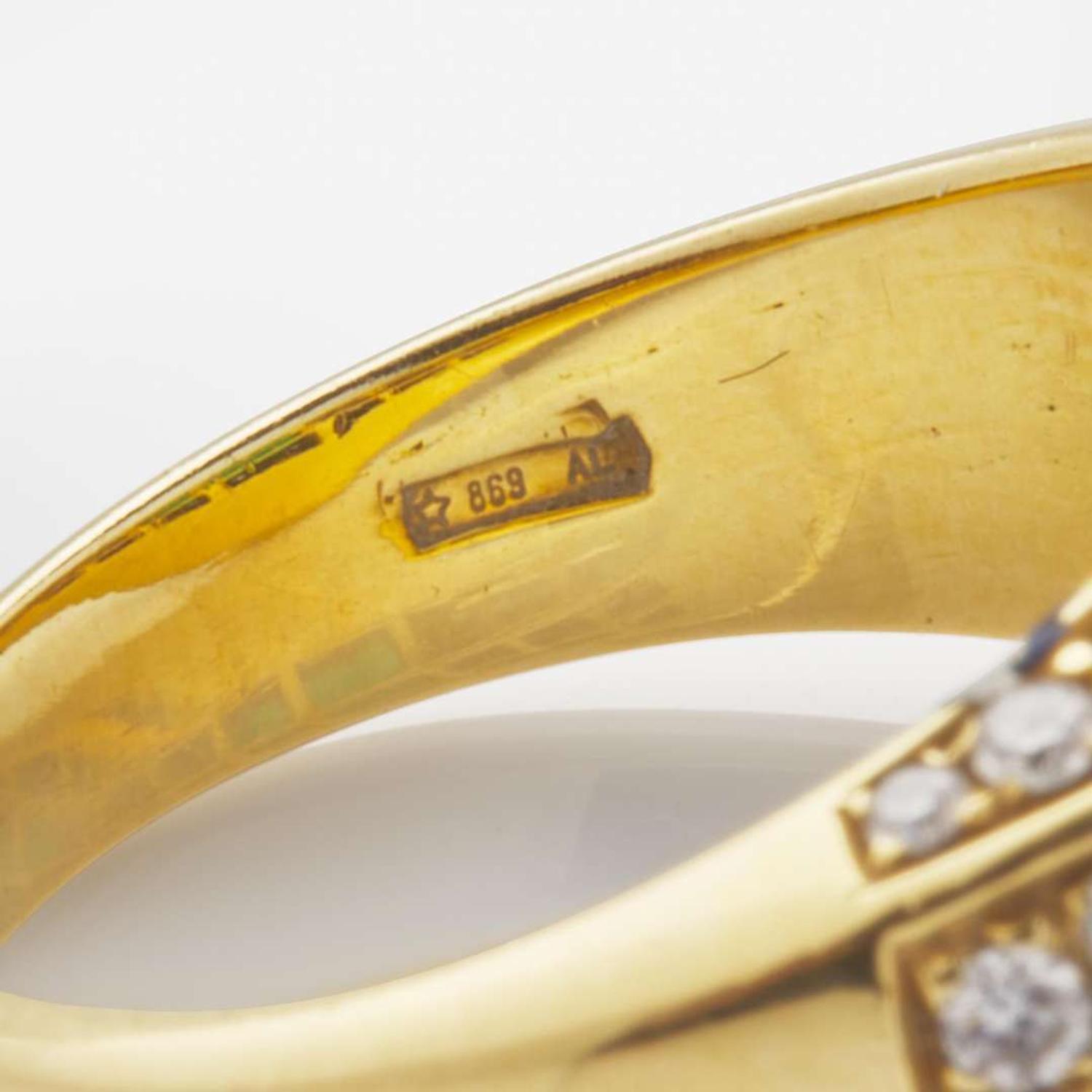 An 18K Yellow Gold, Diamond, and Emerald Ring