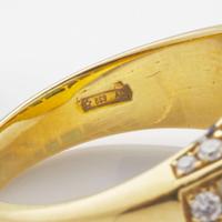 An 18K Yellow Gold, Diamond, and Emerald Ring