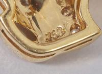 A Set of Sapphire and Diamond Ear Clips and Pin