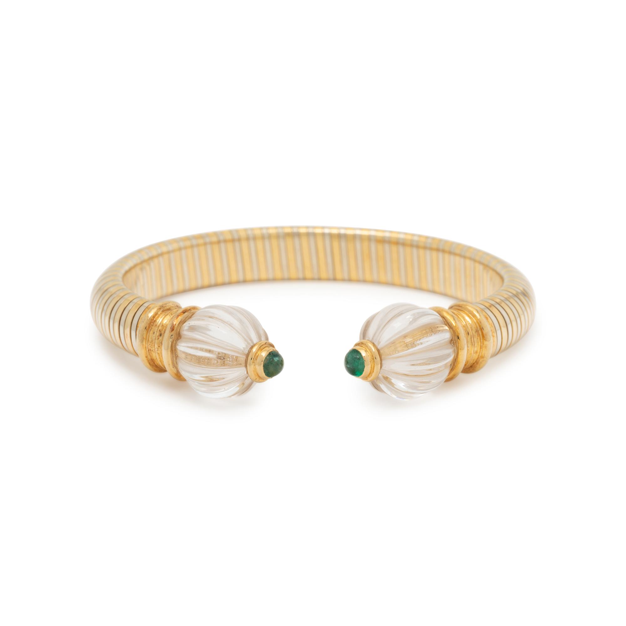 BOUCHERON, BICOLOR GOLD, ROCK CRYSTAL, AND EMERALD CUFF BRACELET