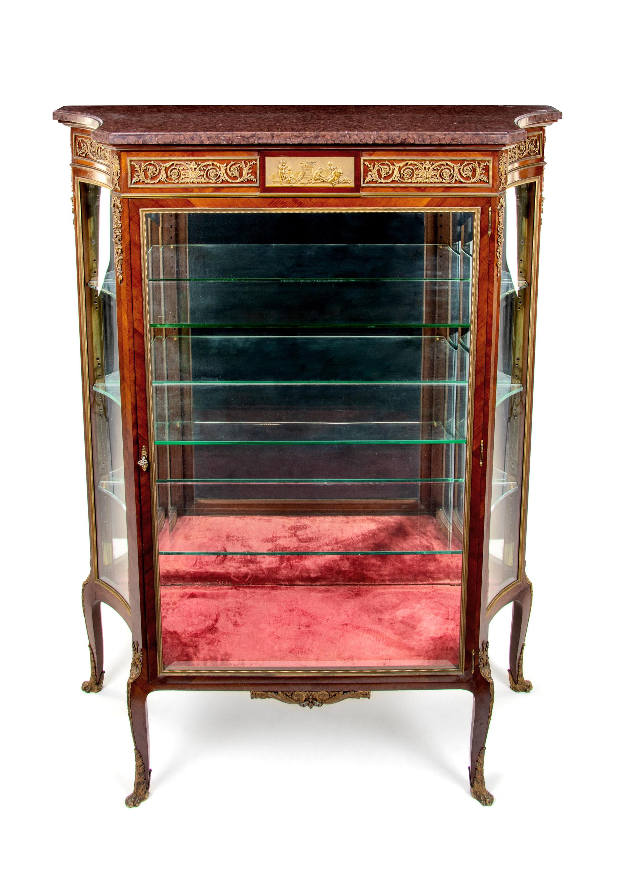 A Louis XV Style Gilt Bronze Mounted Marble-Top Vitrine Cabinet