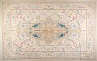 A Textile Needle Point Rug 13 feet 5 inches x 9 feet 4 1/2 inches.