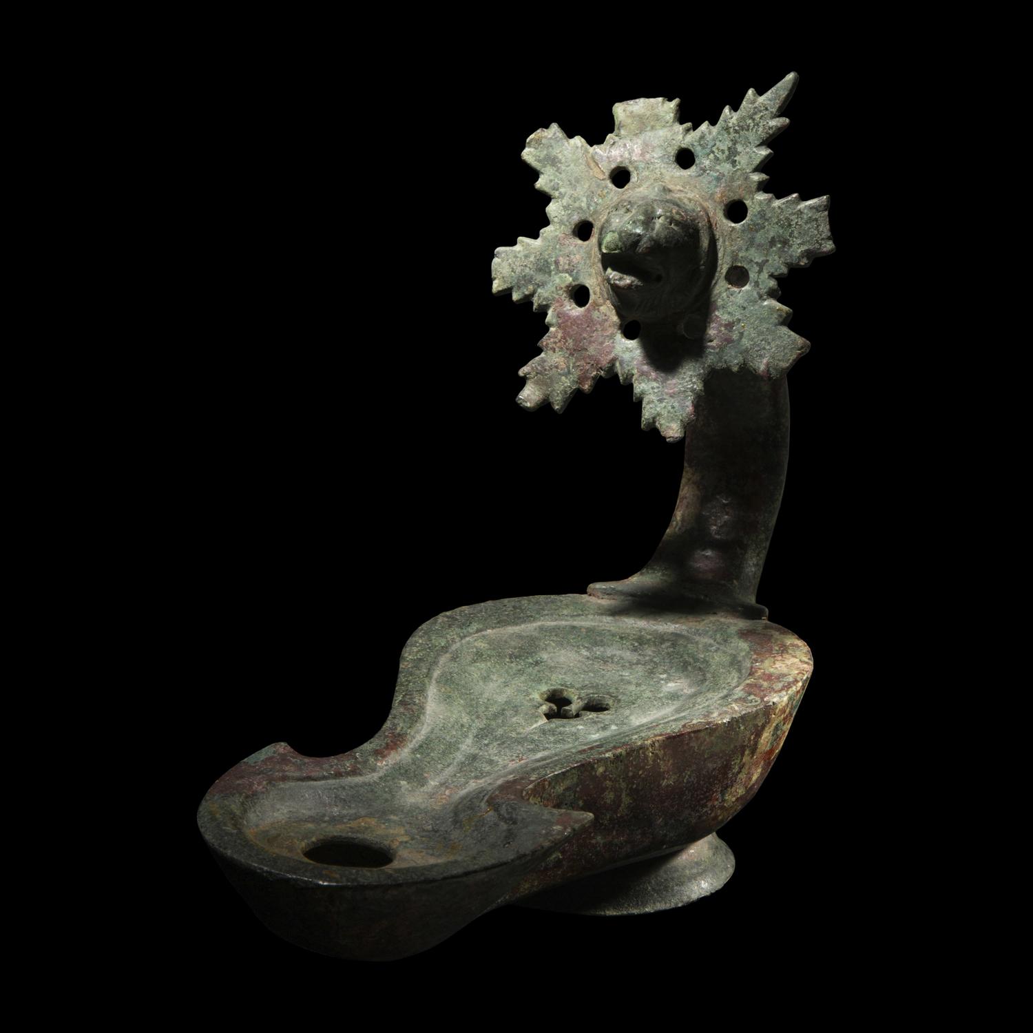 A Roman Bronze Oil Lamp