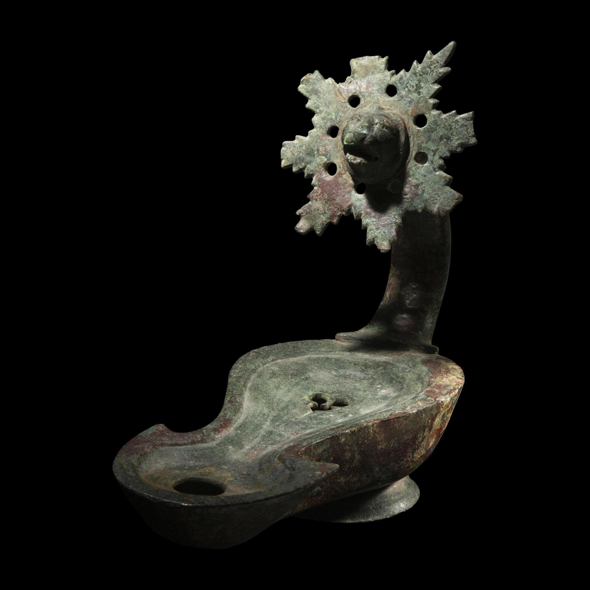 A Roman Bronze Oil Lamp