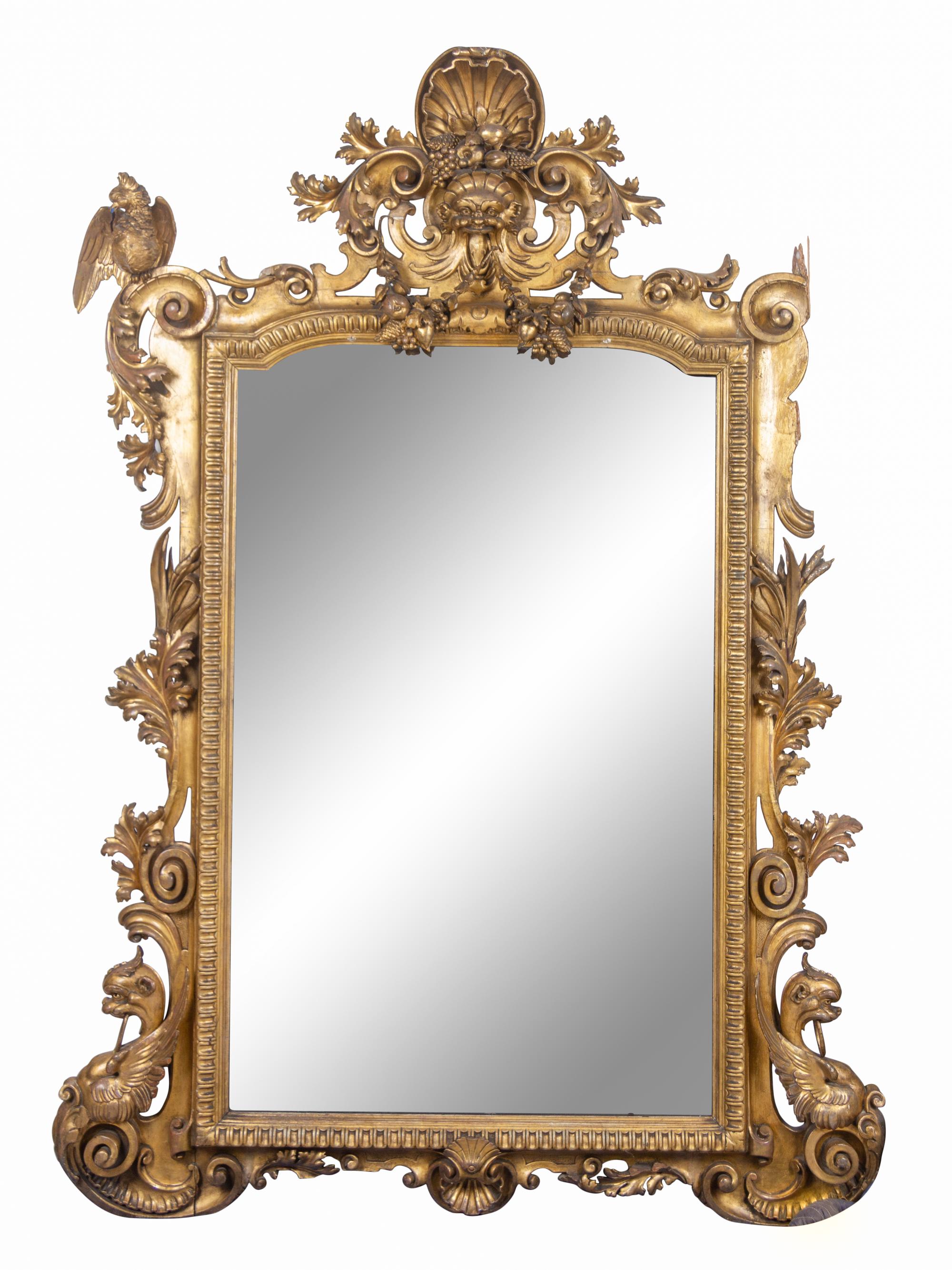 A Large Italian Baroque Style Giltwood Mirror
