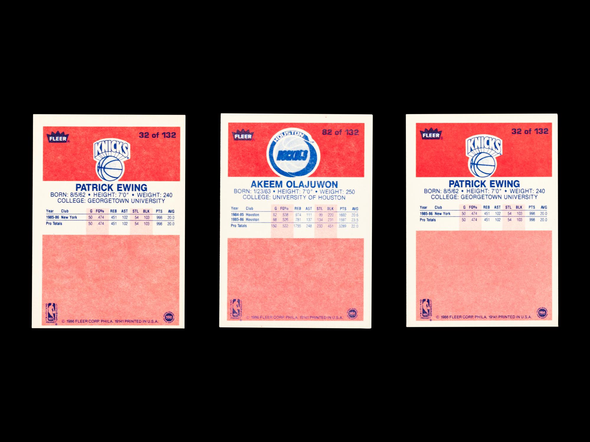 A Group of Three 1986 Fleer Patrick Ewing and Hakeem Olajuwon Rookie Basketball Cards,