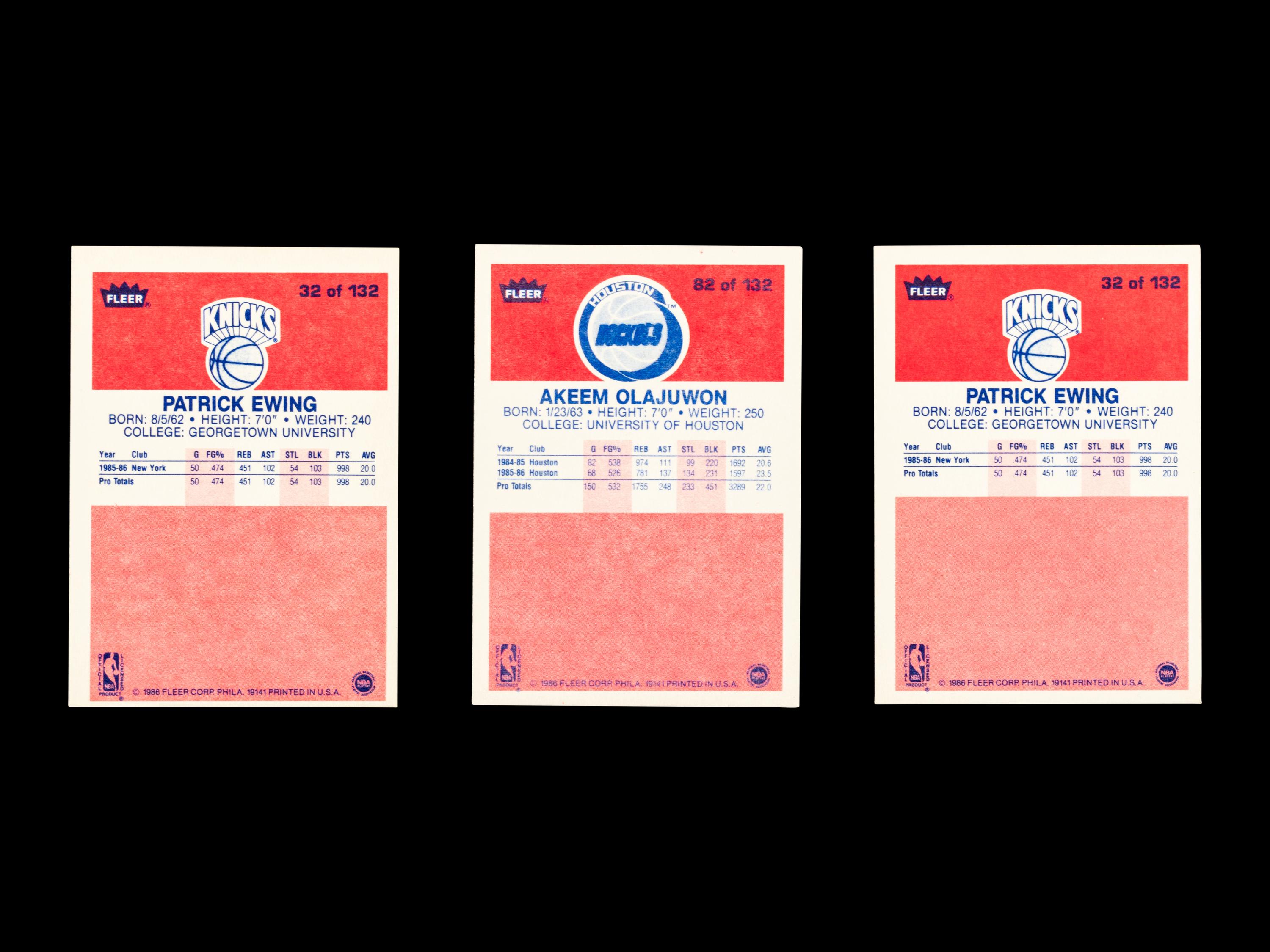 A Group of Three 1986 Fleer Patrick Ewing and Hakeem Olajuwon Rookie Basketball Cards,