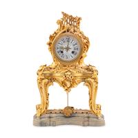 A Louis XV Style Gilt Bronze and Marble Table-Form Mantel Clock
