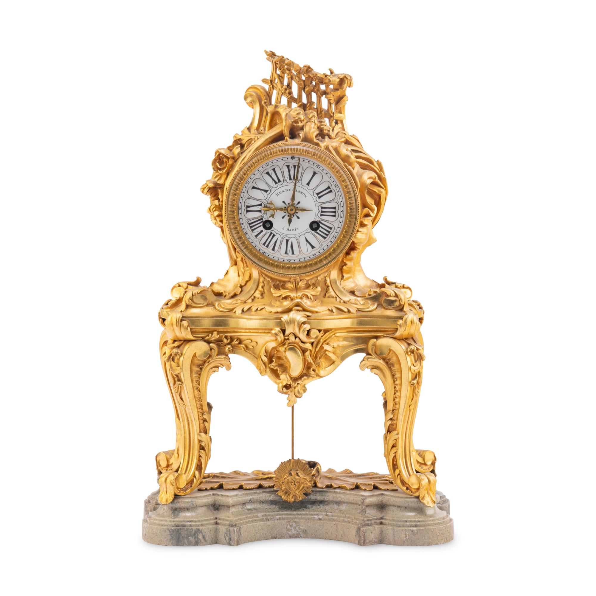 A Louis XV Style Gilt Bronze and Marble Table-Form Mantel Clock