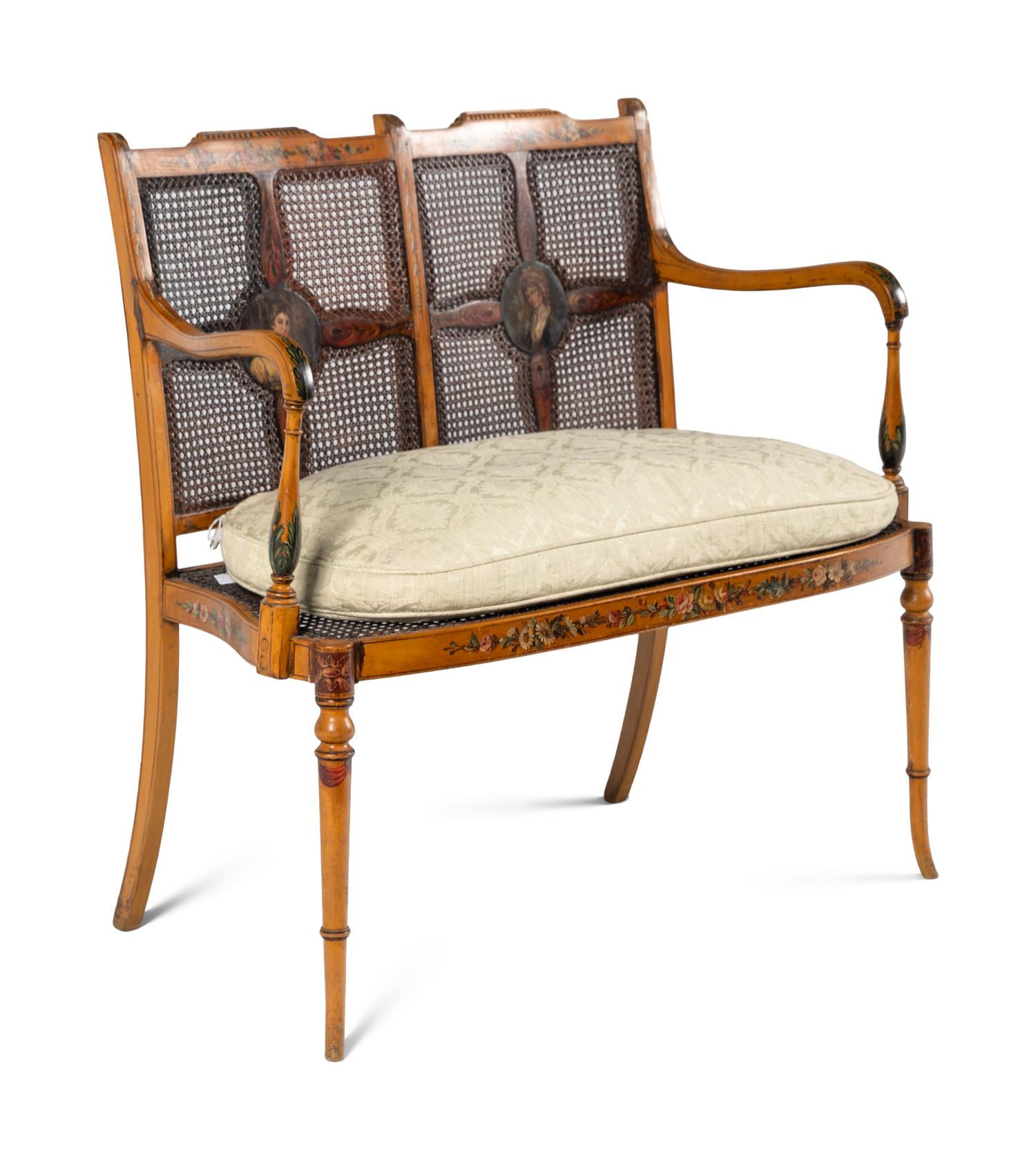 An Edwardian Painted Satinwood Settee