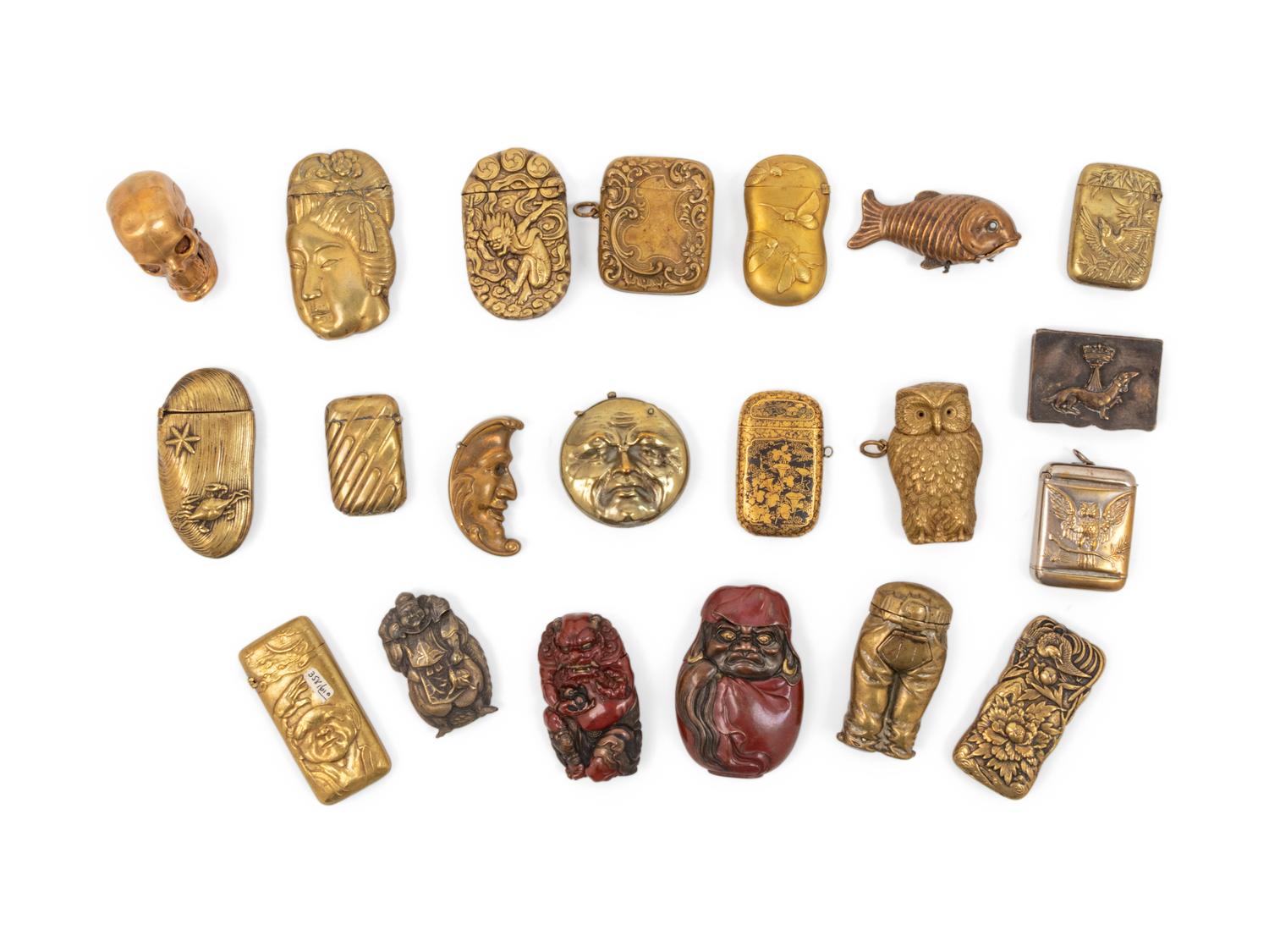A Collection of Japanese Brass Match Safes