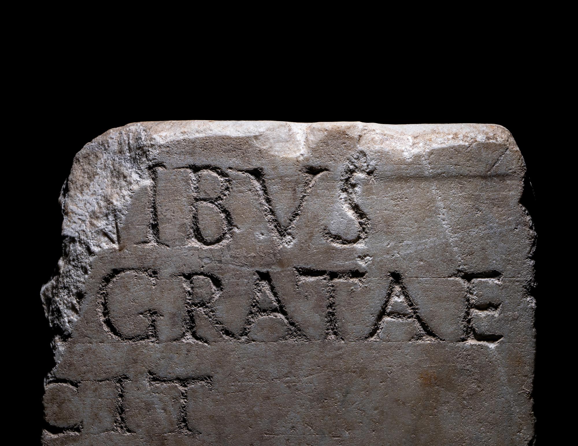 A Roman Marble Fragment with Latin Inscription