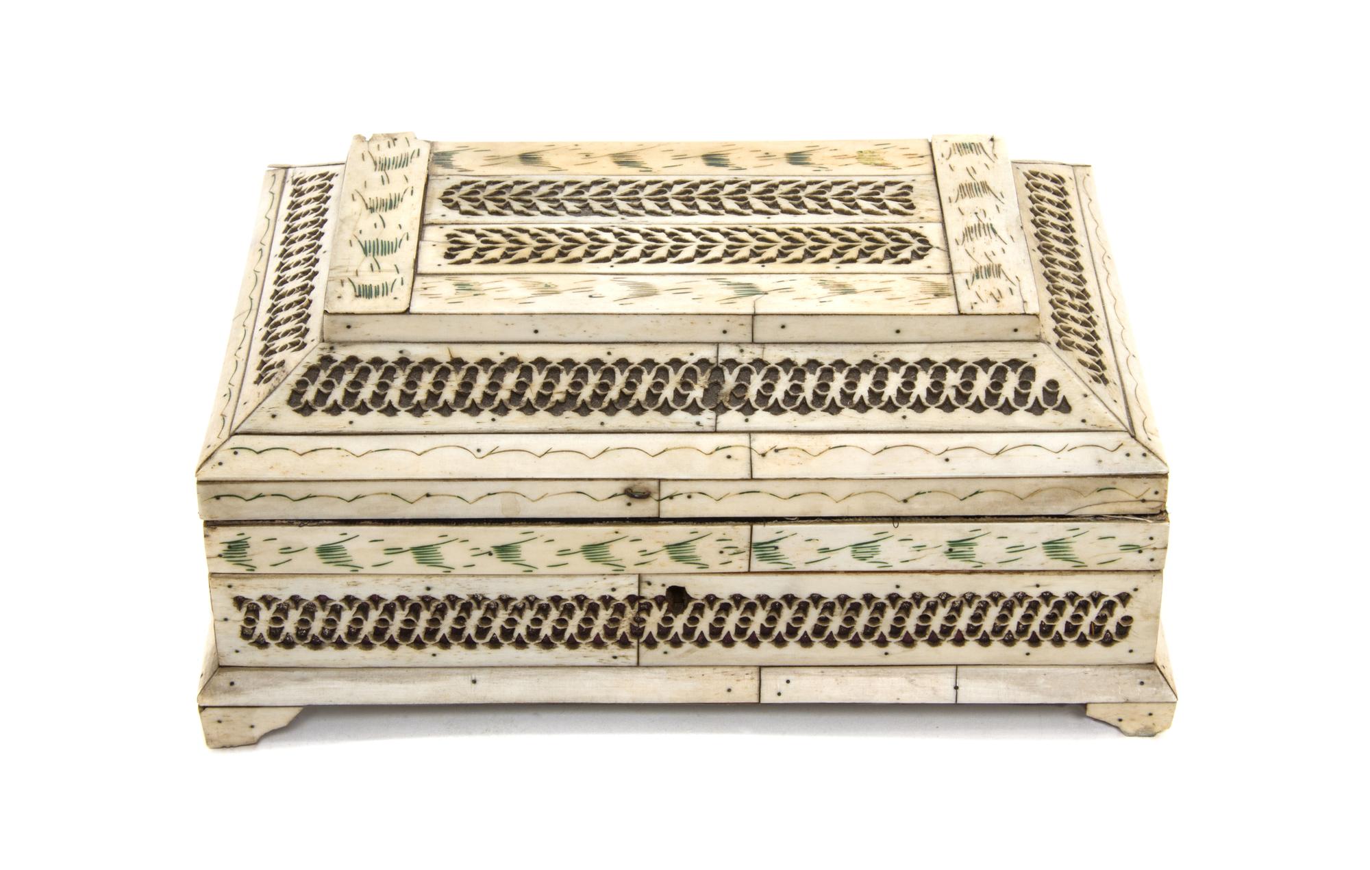 A Russian Bone Veneered Table Casket, Height 4 x width 8 7/8 x depth 6 inches.