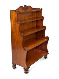 A George IV Carved Mahogany Waterfall Bookshelf In the Manner of Gillows — 19TH CENTURY