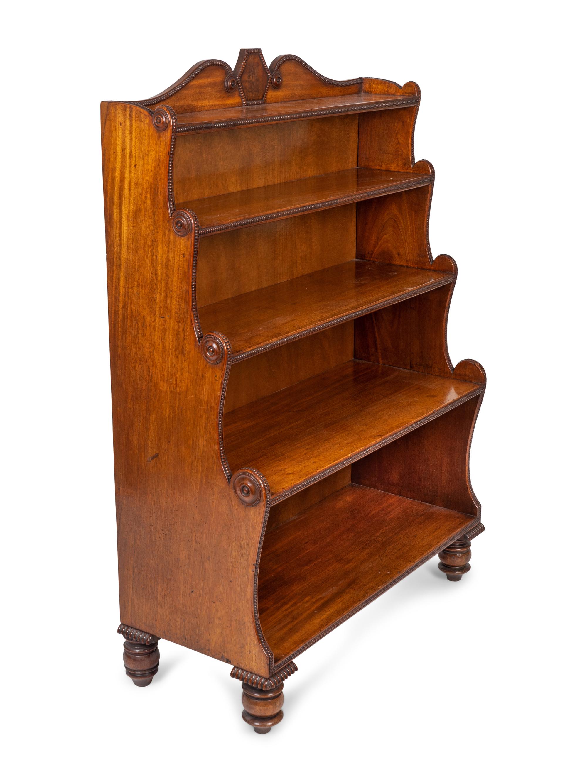 A George IV Carved Mahogany Waterfall Bookshelf In the Manner of Gillows — 19TH CENTURY