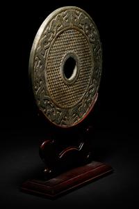 A Chinese Liangzhu-s tyle Carved Nephrite Jade Bi Disc