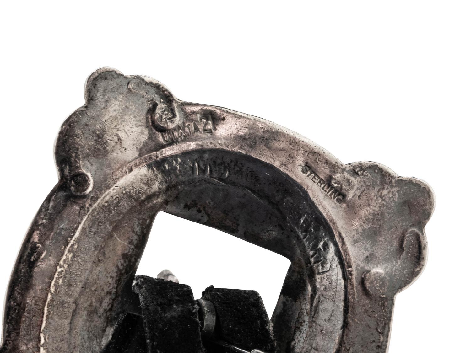 A Southwestern Silver and Leather Belt
