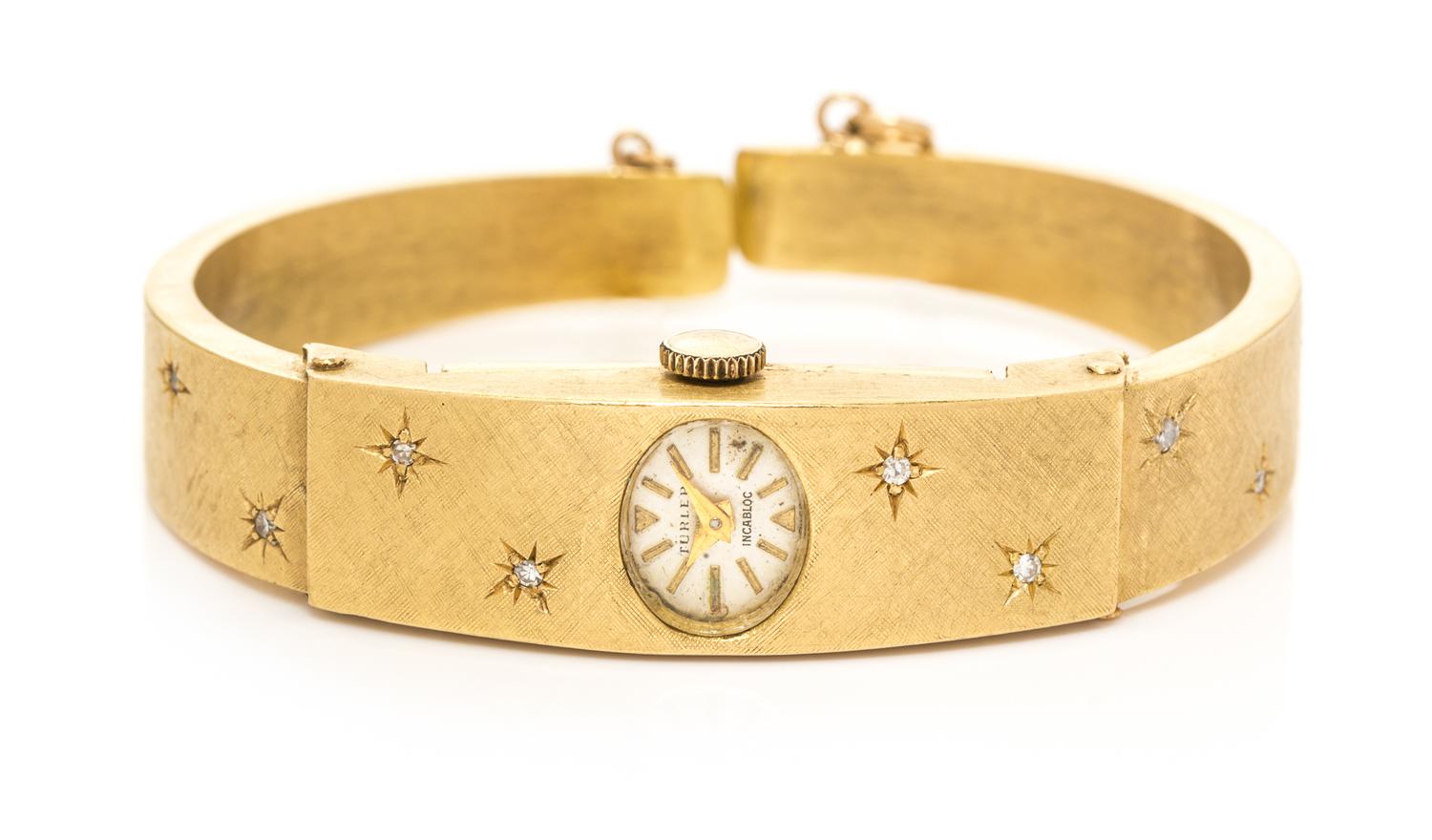 An 18 Karat Yellow Gold and Diamond Bangle Wristwatch, Turler, 12.10 dwts.
