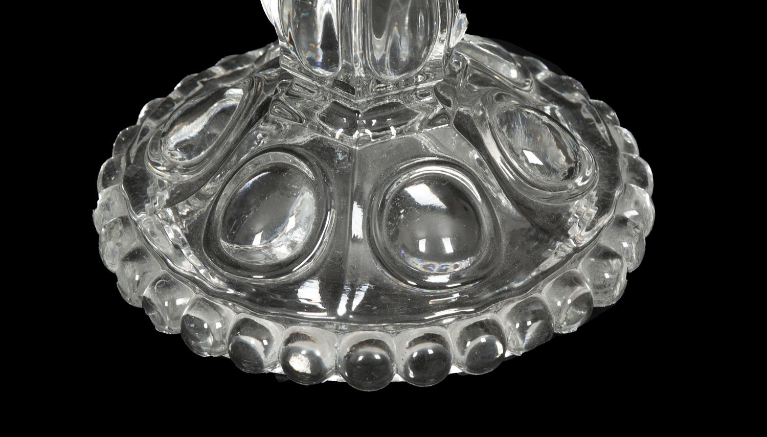 A Set of Four Baccarat Glass Hurricane Lamps