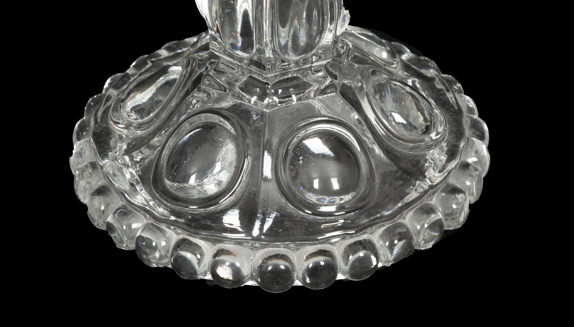 A Set of Four Baccarat Glass Hurricane Lamps