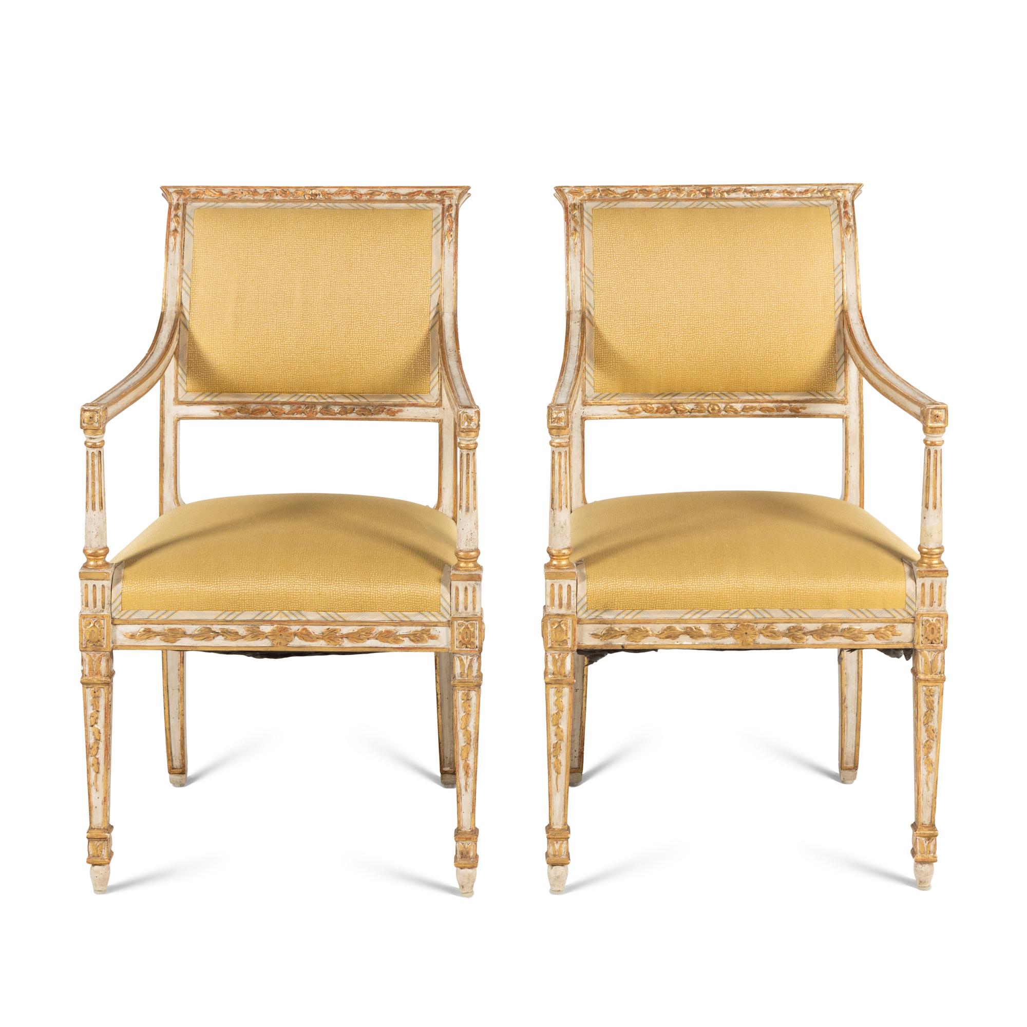 A Pair of Italian Neoclassical Style White-Painted and Parcel Gilt Fauteuils