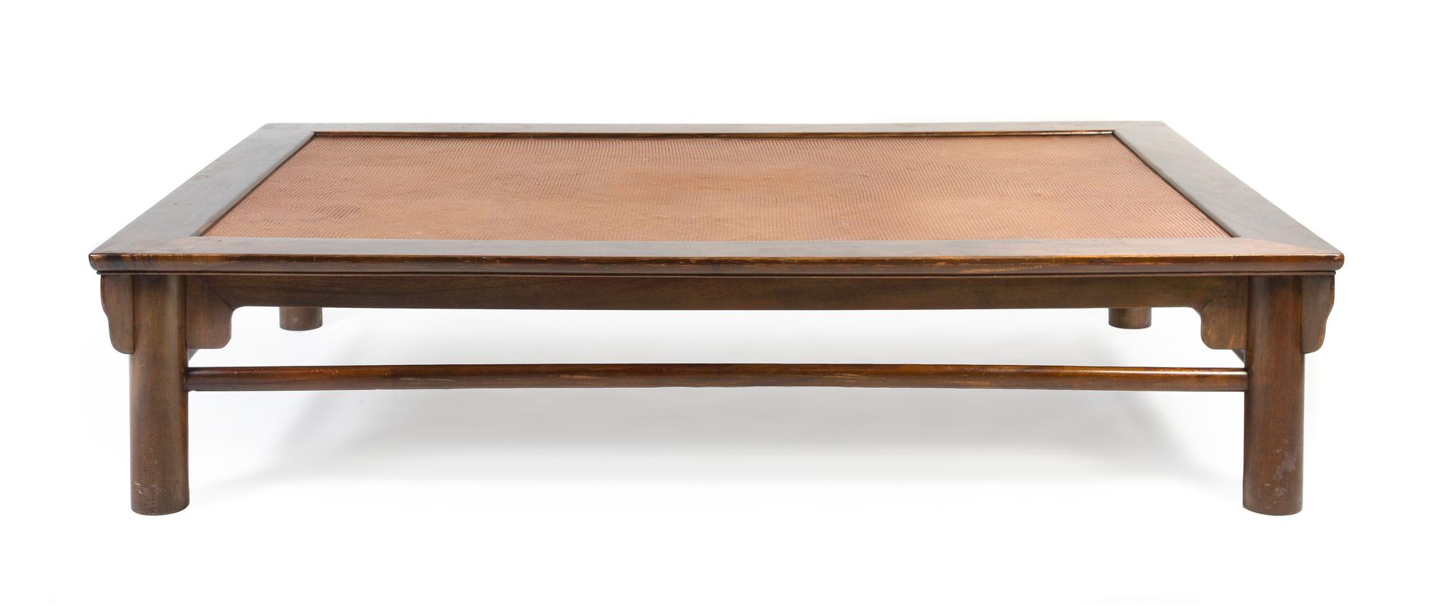 A Chinese Simulated Rosewood Opium Bed Height 16 x width 72 x depth 48 inches.