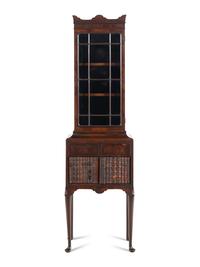 A Regency Mahogany and Faux-Book Decorated Vitrine Cabinet on Stand