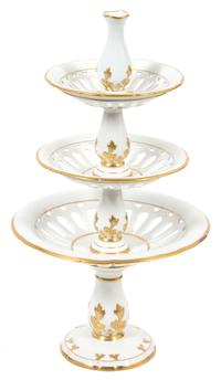 A Paris Porcelain Three-Tier Dessert Tazza Height 27 1/2 x diameter 15 inches. — 19TH CENTURY