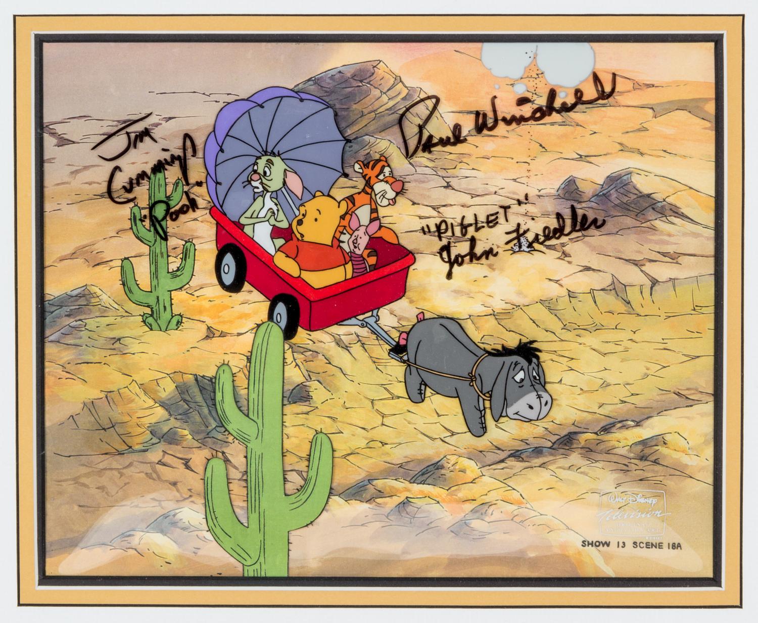 (WALT DISNEY STUDIOS) Celluloid of Eeyore, Piglet, Tigger, Rabbit, and Winnie the Pooh. Size of frame 14 1/2 x 16 3/4 inches. Signed.