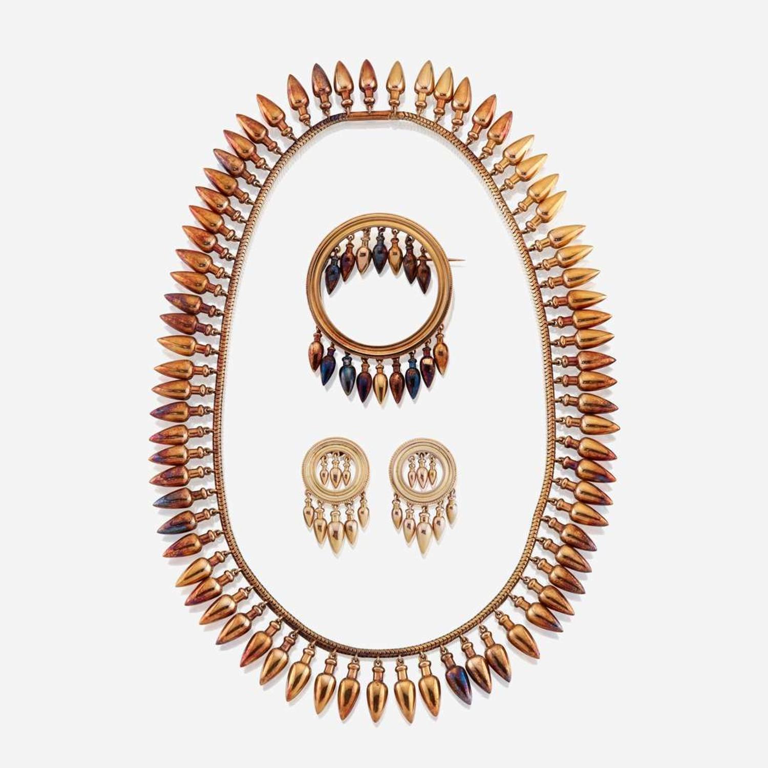 A fourteen and eighteen karat gold suite